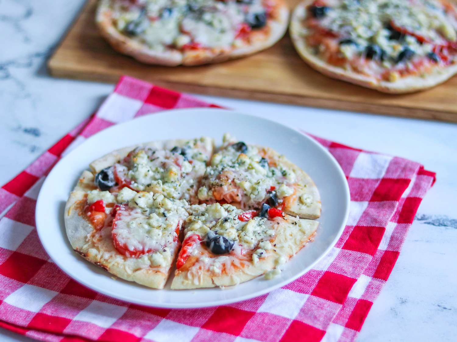 Herbed Pita Pizzas with Mozzarella and Blue Cheese